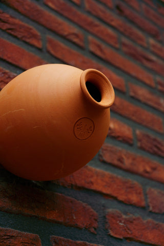 Casetta per uccelli in terracotta