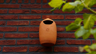 Casetta per uccelli in terracotta